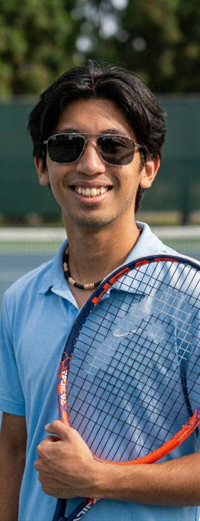 Poom, head coach of Poom's Tennis Academy